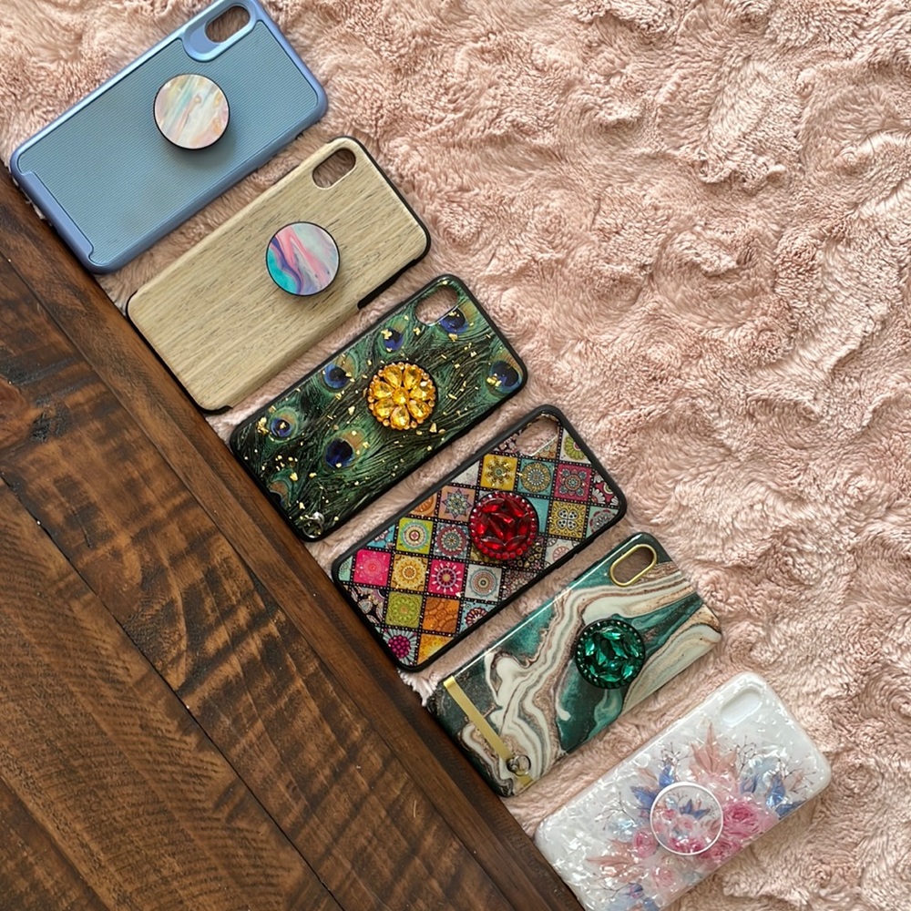 XS MAX iPhone cases, with attached pop sockets.